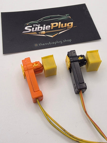 Two electronic connectors with wires on a white background, featuring the Subie Plug brand.